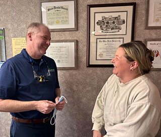 Orthodontic consultation with Dr. Sweeney and a parent in North Olmsted