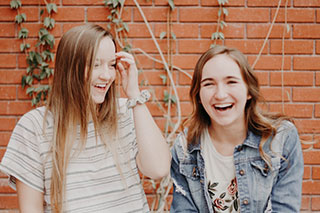 Teens smiling